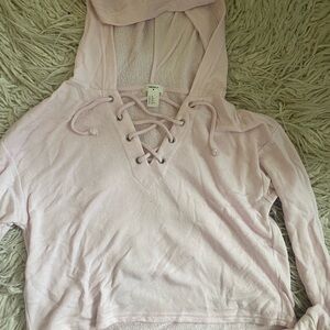 Forever 21 baby Pink hoodie with crossed draw string thin loose fitting